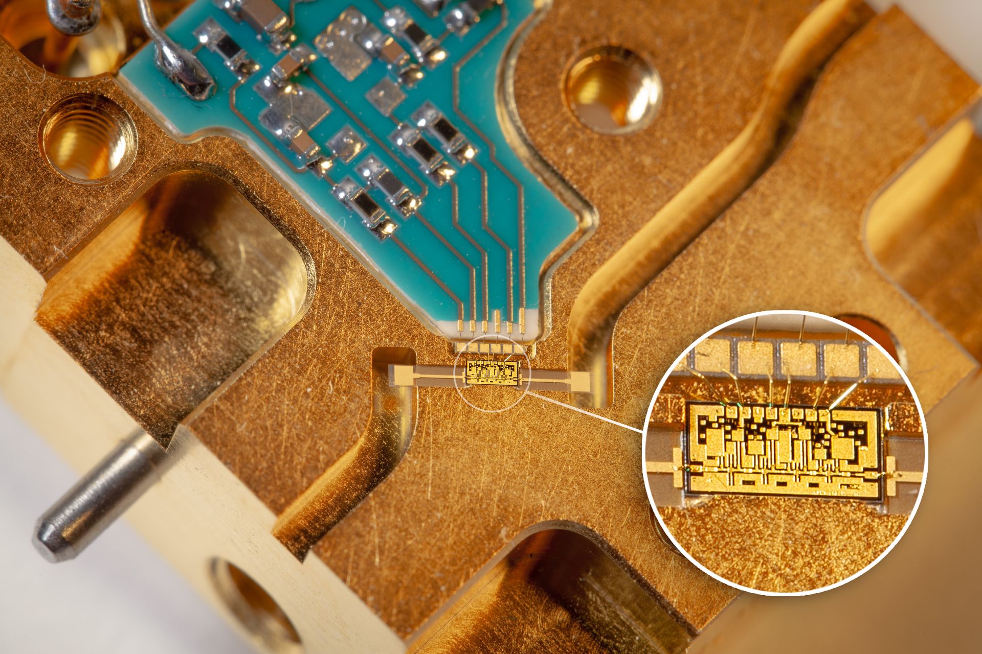 Close-up of an 89 GHz LNA MMIC integrated into the corresponding AWS LNA module